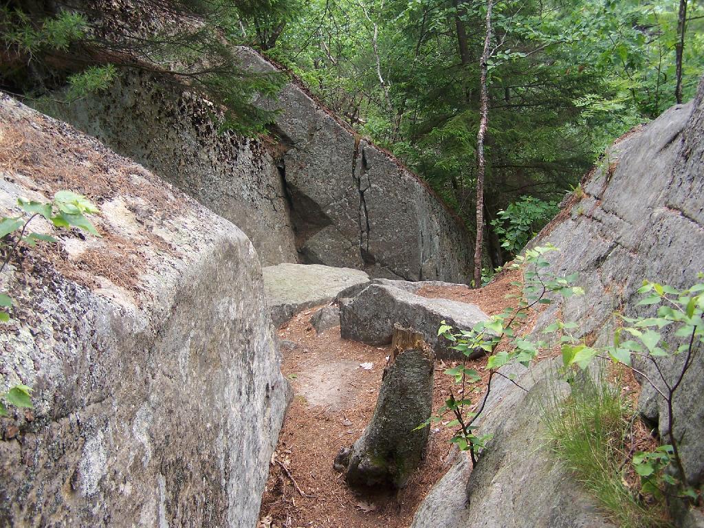 Photo: Trail Descends Between Rocks Photo: Trail Descends Between Rocks