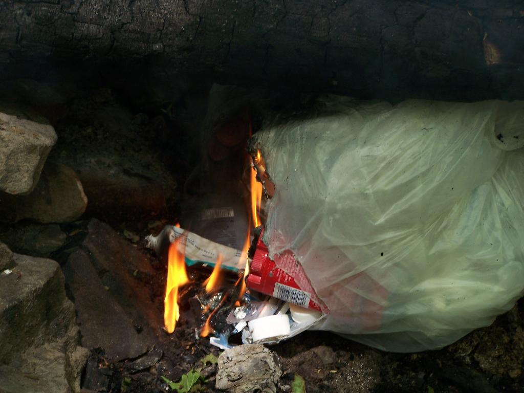Photo: Starting Some Trash on Fire