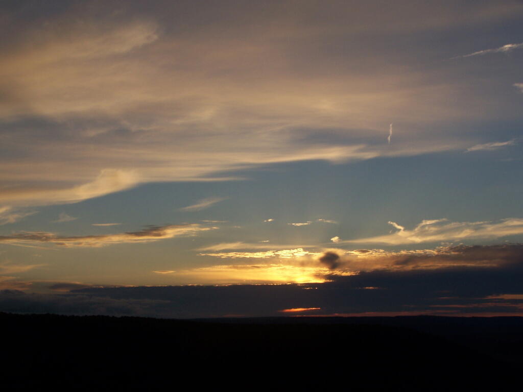 Photo: Sunsets Into Clouds Photo: Sunsets Into Clouds