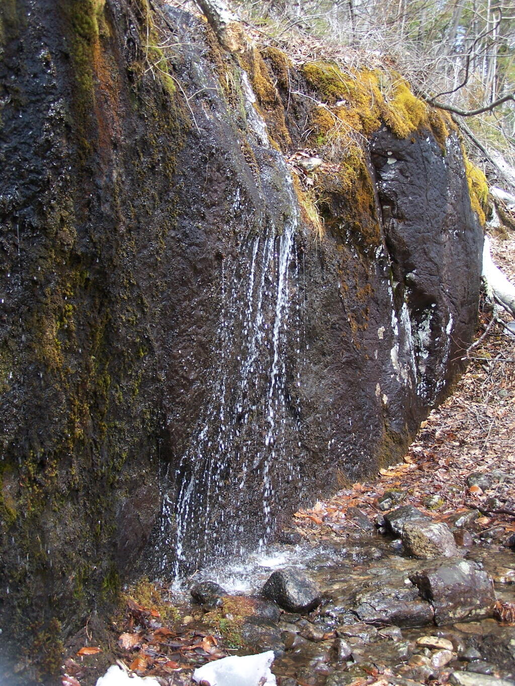 Photo: Snow Melt Along Cliff Edge