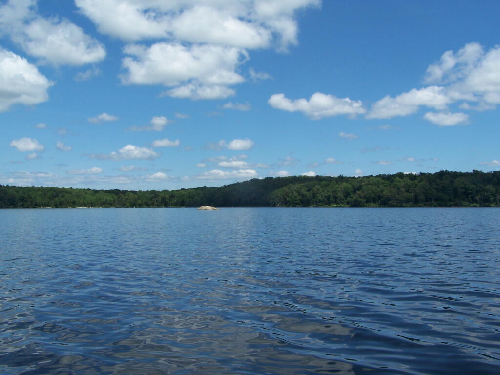 Photo: Boulder Sticking Up in Lake