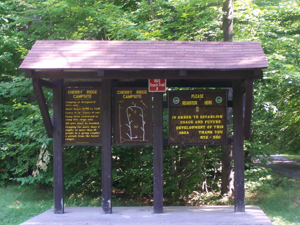 Photo: Register Here Sign and Kiosk