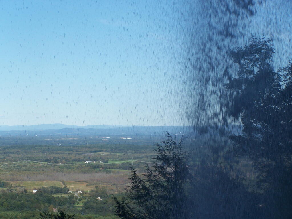 Photo: Valley with Water in Front of It Photo: Valley with Water in Front of It