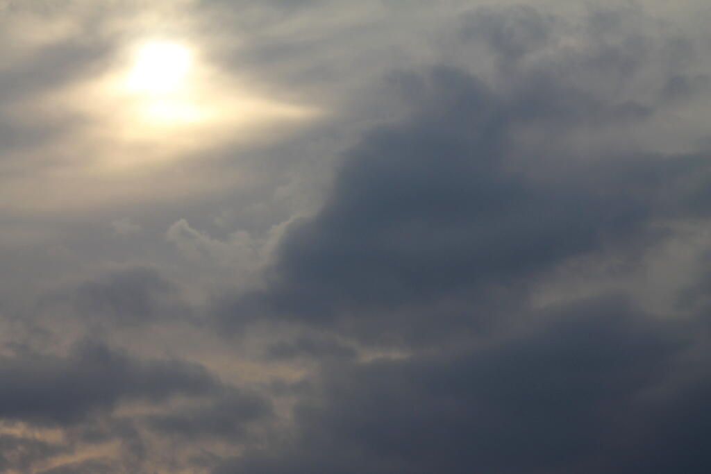 Photo: Peaking thru the Clouds