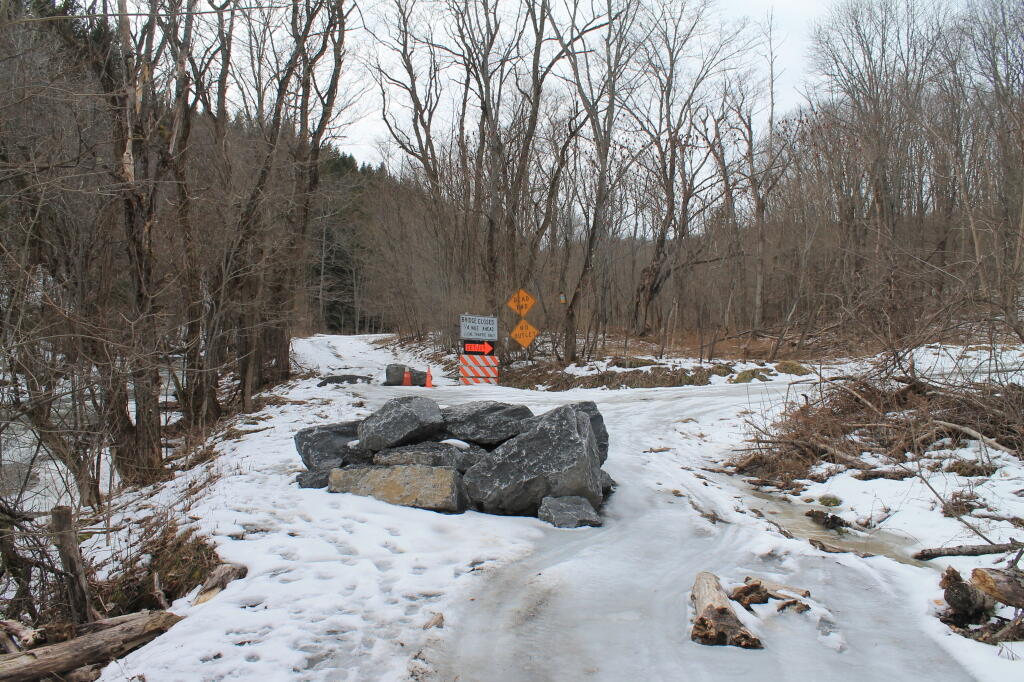 Photo: Baricade on Badly Eroded Road Photo: Baricade on Badly Eroded Road