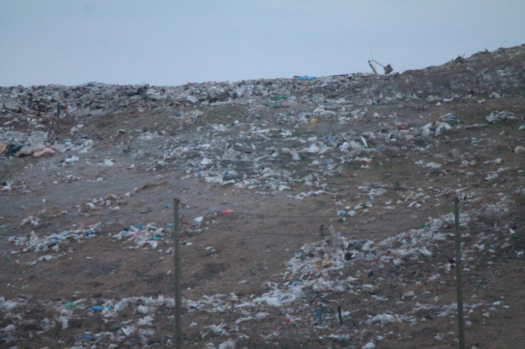 Photo: Landfill Fence, Methane Pump Photo: Landfill Fence, Methane Pump