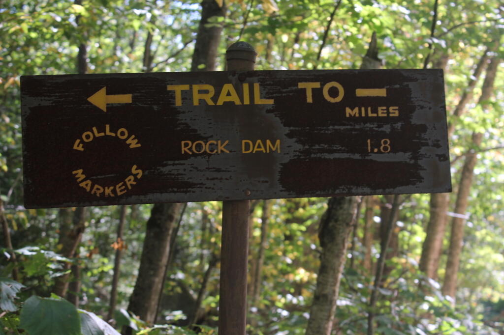 Photo: Old Style Steel Rock Dam Trailhead Sign