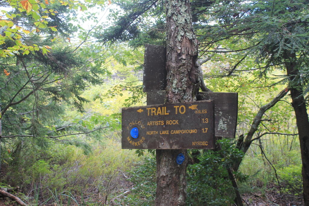 Photo: Trail Distance Signs from Badman Cave Photo: Trail Distance Signs from Badman Cave
