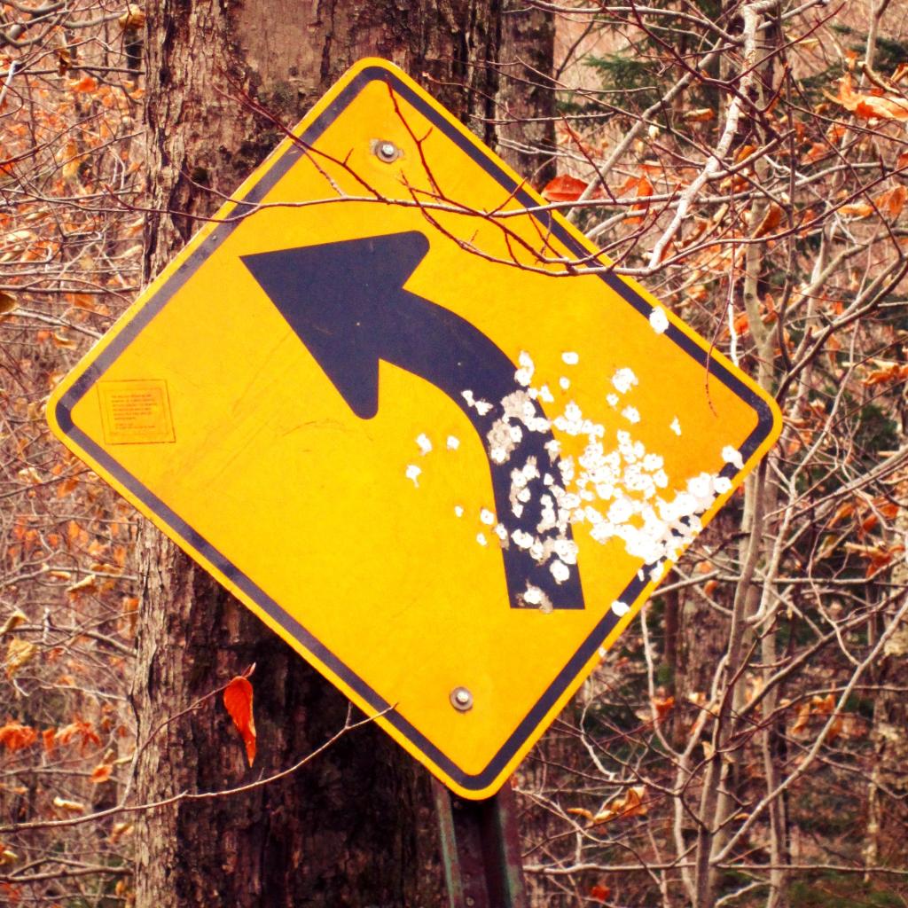 Photo: The more bullet holes in a road sign, the nicer the area Photo: The more bullet holes in a road sign, the nicer the area