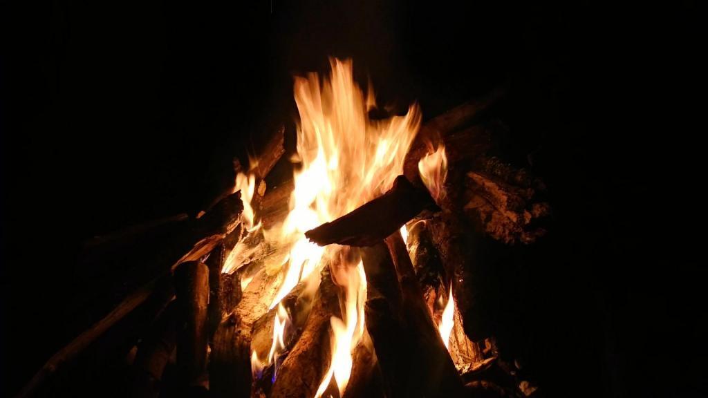 Photo: The fire helped pass the time on the cold and damp evenings
