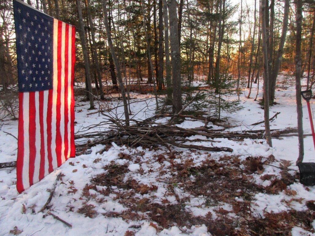 Photo: Gathering Wood Getting Area Shoveled Out For Campfire