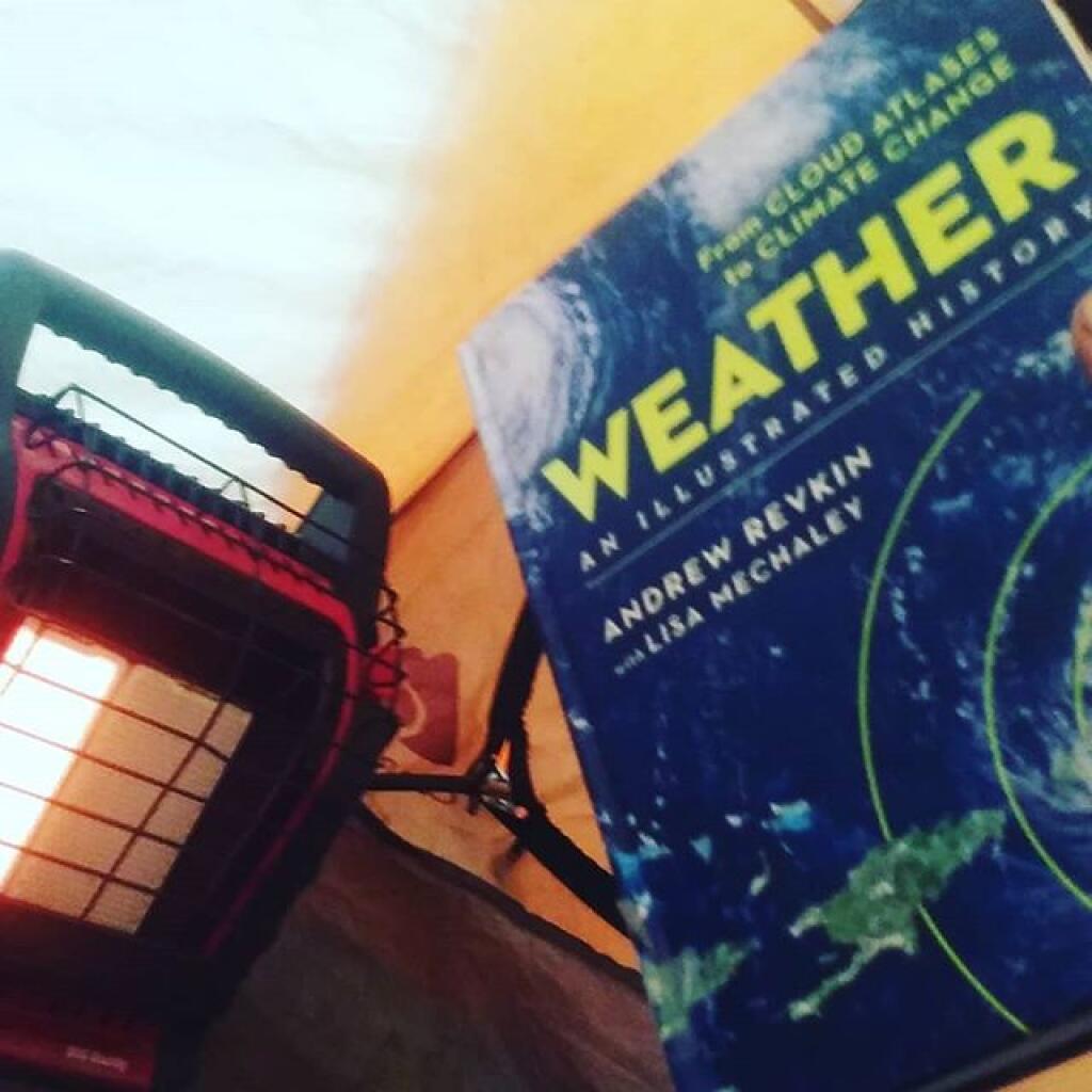Photo: Might be cold and wet outside but it's hot in here with a good book